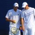 Chris Guccione and Carsten Ball talk tactics in a double match.