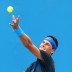 Bernard Tomic serves during Medibank International Sydney 2011.