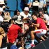Novak Djokovic lunged into the photographers pit.