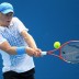 Luke Saville plays a backhand in his second match match at the 2011 Australian Open juniors' tournament.