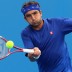 Marinko Matosevic in action on day two of Australian Open 2011. Getty Images