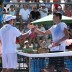 Grega Zemlja (left) and Bernard Tomic meet at the net after the Caloundra International men's singles final. Photo: Rob Hamilton