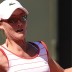 Australia's Samantha Stosur returns a ball to Romania's Simona Halep during their second round match at the 2011 French Open. Getty Images
