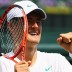 Bernard Tomic celebrates after his fourth round win over Xavier Malisse at Wimbledon 2011. Getty Images