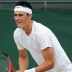 Bernard Tomic in action at Wimbledon 2011. Getty Images