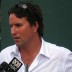 Pat Rafter talks to the media at Wimbledon.