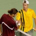 Roger Federer (left) and Lleyton Hewitt shake hands following their marathon five-setter at Rod Laver Arena in 2003. AFP