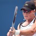Samantha Stosur of Australia returns a serve against Serena Williams during the Rogers Cup final in Toronto. Getty Images