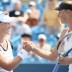 Sam Stosur (left) and Maria Sharapova shake hands following their quarterfinal match in Cincinatti. GETTY IMAGES
