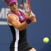 Sam hits a strong forehand
