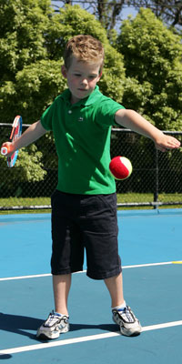 Boy hitting a forehand