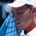 Hot on court: James Duckworth takes a break during his match with ninth seed Janko Tipsarevic. GETTY IMAGES