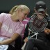 Jelena Dokic and team coach Nicole Bradtke. (freshfocus)