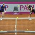 Sam Stosur and Casey Dellacqua practice their serves. (freshfocus)