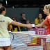 Jarmila Gajdosova and Stefanie Voegel shake hands. FRESHFOCUS