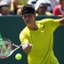 Things got significantly tougher for Tomic in the second round when he faced No.5 seed David Ferrer of Spain; Getty Images