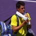 Far from disgraced, Tomic left the court following his 6-4 6-4 loss to Ferrer; Getty Images