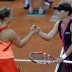 Kerber (L) and Stosur shake hands after Stosur recorded a 7-6(1) 6-4 victory to hand Australia an early 1-0 lead in the tie; Getty Images