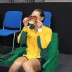 Sam Stosur gets up close and personal with a pretzel; Tennis Australia