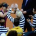 Sam Stosur celebrates with teammates after clinching the Fed Cup tie for Australia following her defeat of German Andrea Petkovic on Day 2 at Porsche Arena in Stuttgart; Getty Images