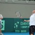 Lleyton Hewitt watches Todd Woodbridge