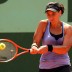 Casey Dellacqua hits a backhand during her first round match against Sara Errani on day one of the French Open at Roland Garros in Paris; Getty Images