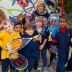 Essendon footballer Dyson Heppell with students from Stonnington Primary School. MARK RIEDY