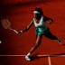 Serena Williams advances on the net during her first round match against Frenchwoman Virginie Razzano, the final match of Day 3 on Court Phillipe Chatrier. Williams led by a set and 5-1 in the second set tiebreak before things started to unravel; Getty Images