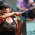 No.2 seed Maria Sharapova shows off her devastating power during a 6-0 6-0 demolition of Romania's Alexandra Cadantu in her first round match on Court Suzanne Lenglen on Day 3 of the French Open; Getty Images