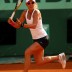 Anastasia Rodionova stretches for a forehand during her epic first round match against Frenchwoman Mathilde Johansson, in which she eventually went down 5-7 7-6(6) 6-4; Getty Images
