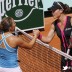 Australia's Samantha Stosur (R) shakes hands with Irina Falconi during their women's Singles 2nd Round tennis match of the French Open tennis tournament at the Roland Garros stadium, on May 30, 2012 in Paris;Getty Images