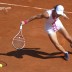 Australia's Samantha Stosur returns the ball to Britain's Elena Baltacha during their Women's Singles 1st Round tennis match of the French Open tennis tournament at the Roland Garros stadium, on May 27, 2012 in Paris; Getty Images