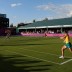 Stosur, pictured playing a backhand, returned to the court following her singles defeat later on Day 1, teaming with Casey Dellacqua in the women's doubles event; Getty Images