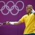 Lleyton Hewitt plays a forehand against Sergiy Stakhovsky of Ukraine on Day 3 of the London 2012 Olympic Games at the All England Lawn Tennis Club; Getty Images