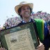 Gustavo "Guga" Kuerten holds his plaque after being inducted into the International Tennis Hall Of Fame July 14, 2012 in Newport, Rhode Island; Getty Images