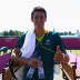 Bernard Tomic gives a thumbs-up after a practice session with Lleyton Hewitt ahead of the 2012 London Olympic Games at Wimbledon; Getty Images