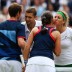 Laura Robson and Andy Murray (near side) of Great Britain greet Victoria Azarenka and Max Mirnyi of Belarus at the net after the Belarusians won their mixed doubles gold medal match 2-6 6-3 [10-8]; Getty Images