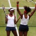 Venus Williams (L) and Serena Williams of the United States celebrate after defeating Andrea Hlavackova and Lucie Hradecka of Czech Republic in the women's doubles gold medal match at London 2012; Getty Images