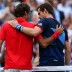 Andy Murray (R) of Great Britain embraces Roger Federer of Switzerland at the net after the men's singles Gold Medal Match on Day 9 of the London 2012 Olympic Games at the All England Club; Getty Images
