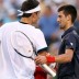 Bernard Tomic (left) and Novak Djokovic, Toronto, 2012. GETTY IMAGES