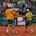 Chris Guccione (left) and Lleyton Hewitt celebrate winning a point. TENNIS AUSTRALIA
