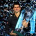 Novak Djokovic of Serbia lifts the trophy as he celebrates victory after his men's singles final win against Roger Federer of Switzerland at the ATP World Tour Finals at O2 Arena in London, England; Getty Images
