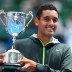 Nick Kyrgios of Australia celebrates with the championship trophy after winning his junior boys' final match against Thanasi Kokkinakis of Australia during the 2013 Australian Open Junior Championships at Melbourne Park on January 26, 2013 in Melbourne, Australia; Getty Images Nick Kyrgios - 2013 Australian Open Junior Championships
