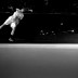 In this converted black-and-white image, Tommy Haas serves to Gilles Simon during his straight-set quarterfinal victory at the Sony Open in Key Biscayne, Florida; Getty Images