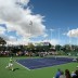 Matthew Ebden hits a return to Andrey Kuznetsov during his three-set win in the first round of the BNP Paribas Open in Indian Wells; Getty Images
