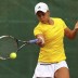 Ash Barty plays a forehand against Stefanie Voegele of Switzerland during their reverse singles rubber at the Fed Cup World Group Play-off tie between Switzerland and Australia at Tennis Club Chiasso in Switzerland; Getty Images