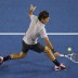 Roger Federer plays a volley during Australian Open 2013; Getty Images