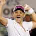 Casey Dellacqua celebrates winning her third round match against Amelie Mauresmo at Australian Open 2008 at Melbourne Park on Rod Laver Arena; Getty Images