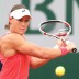 Sam Stosur, playing a backhand in her first round match against Kimiko Date-Krumm of Japan on Day 3 of the French Open, won the opening set in just 21 minutes and raced to a 6-0 3-0 lead; Getty Images