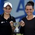 Ash Barty (L) and Casey Dellacqua of Australia pose with the trophy after defeating Cara Black and Marina Erakovic in the doubles final of the AEGON Classic tennis tournament at Edgbaston Priory Club in Birmingham, England; Getty Images